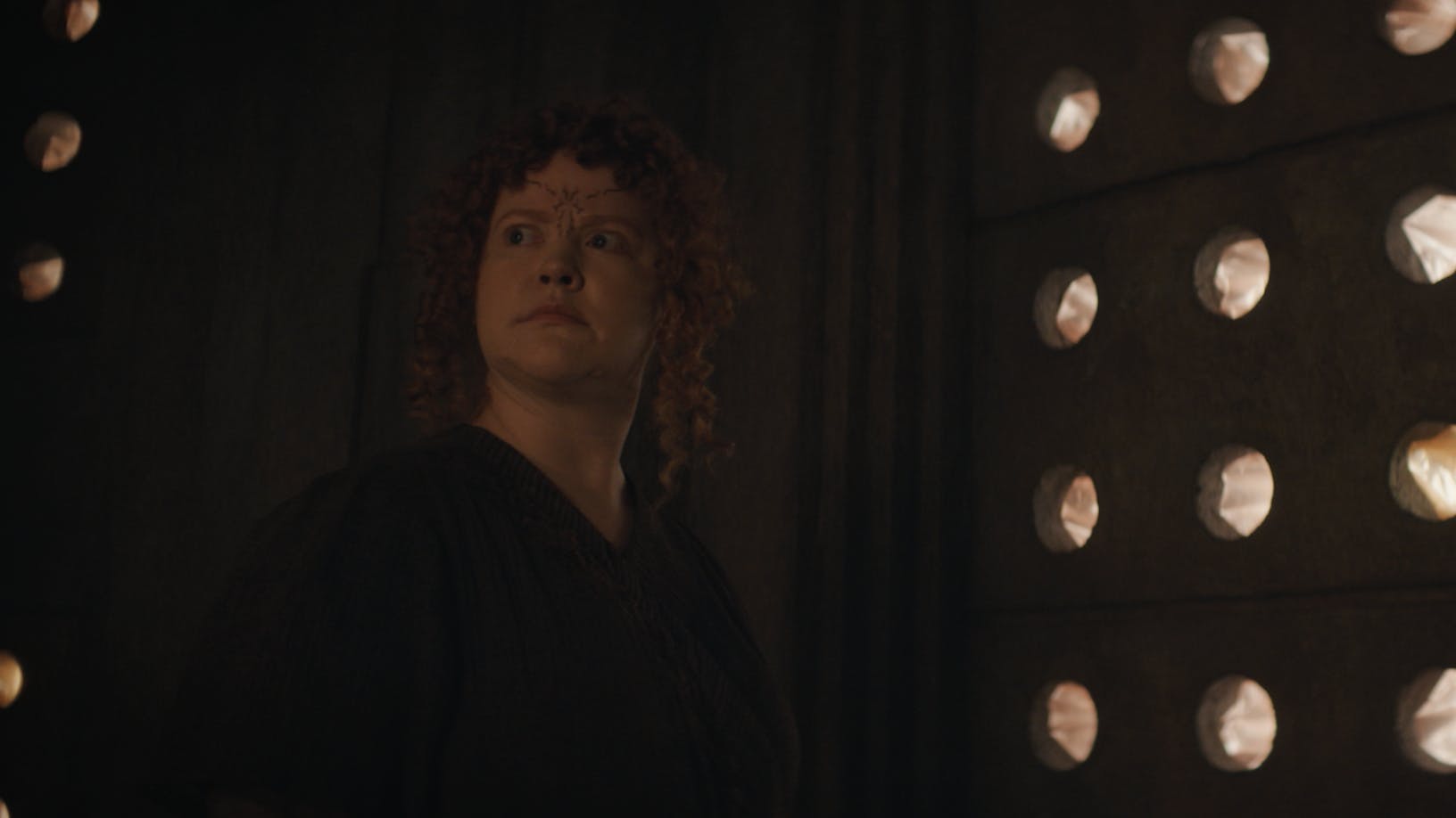 In the temple on Halem'no, Tilly disguised as a Halem'nite looks over her shoulder with extreme concern in 'Whistlespeak'